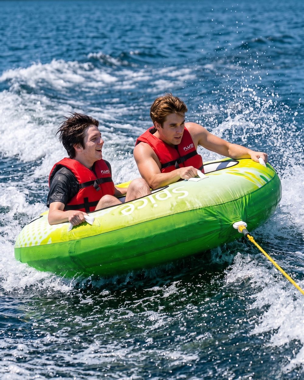 Two riders on a Fluid Splice ski tube
