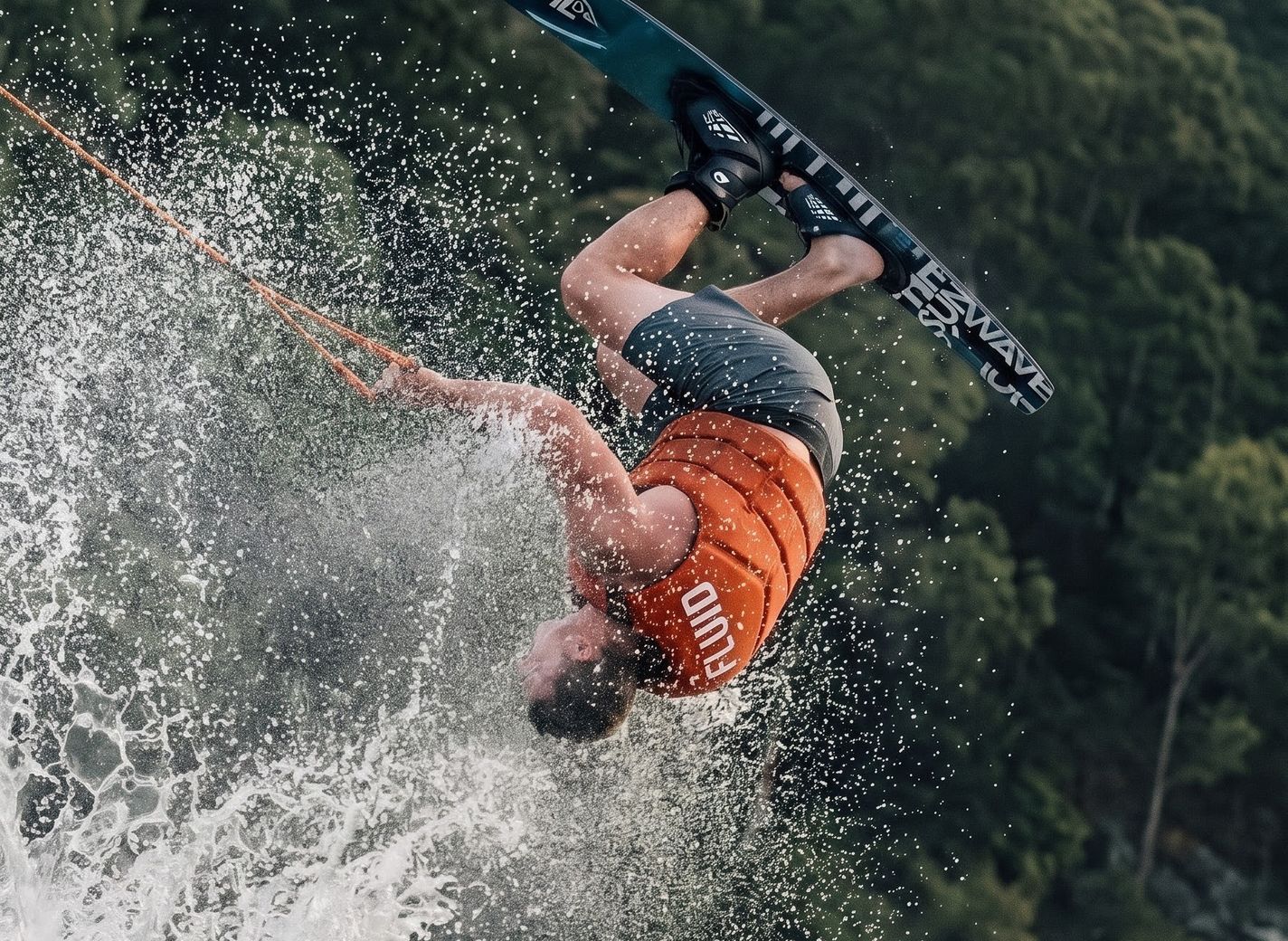 Rider inverted mid-air on a Fluid Recoil ski